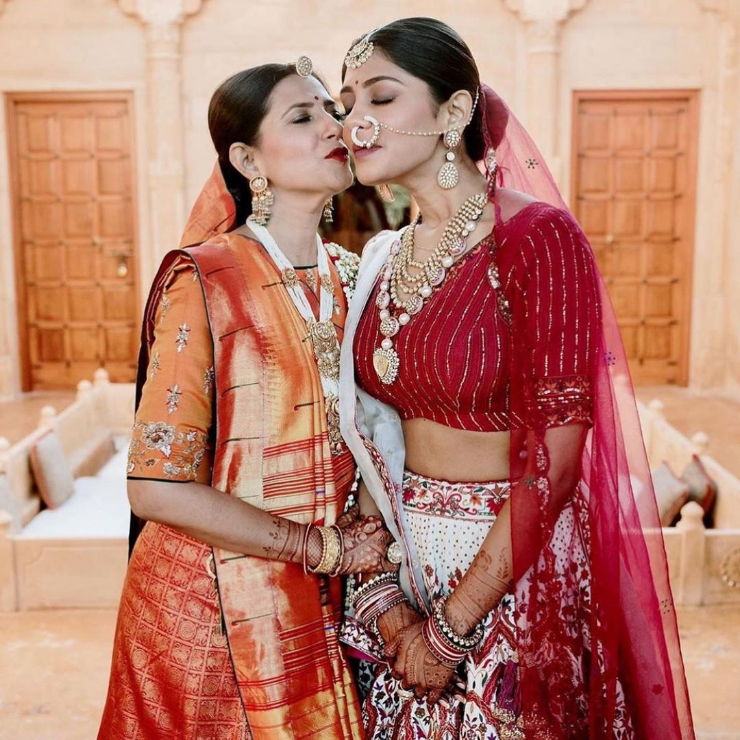 Indian mother poses with model daughter in contrasting outfits; the... News  Photo - Getty Images